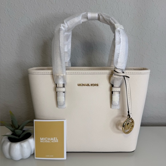 Michael Kors Jet Set Light Cream Leather XS Carryall Top Zip Tote Bag Purse